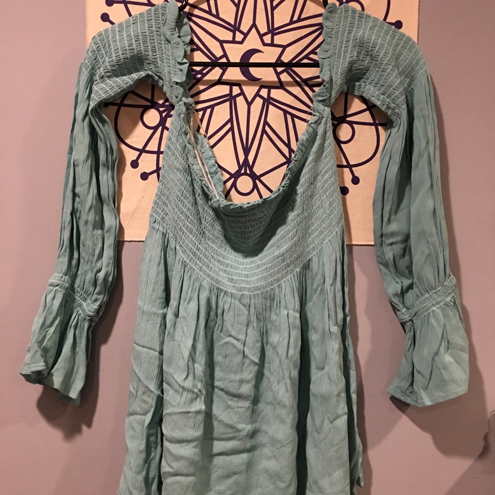 Flowy long sleeve shirt. Womens us size Large. Never worn